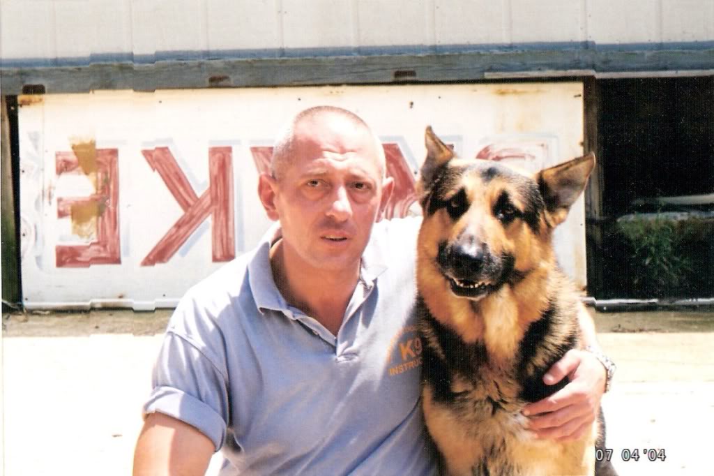 Levon with his own personal German Shepherd, called Grey, trained in protection, security work and search and track